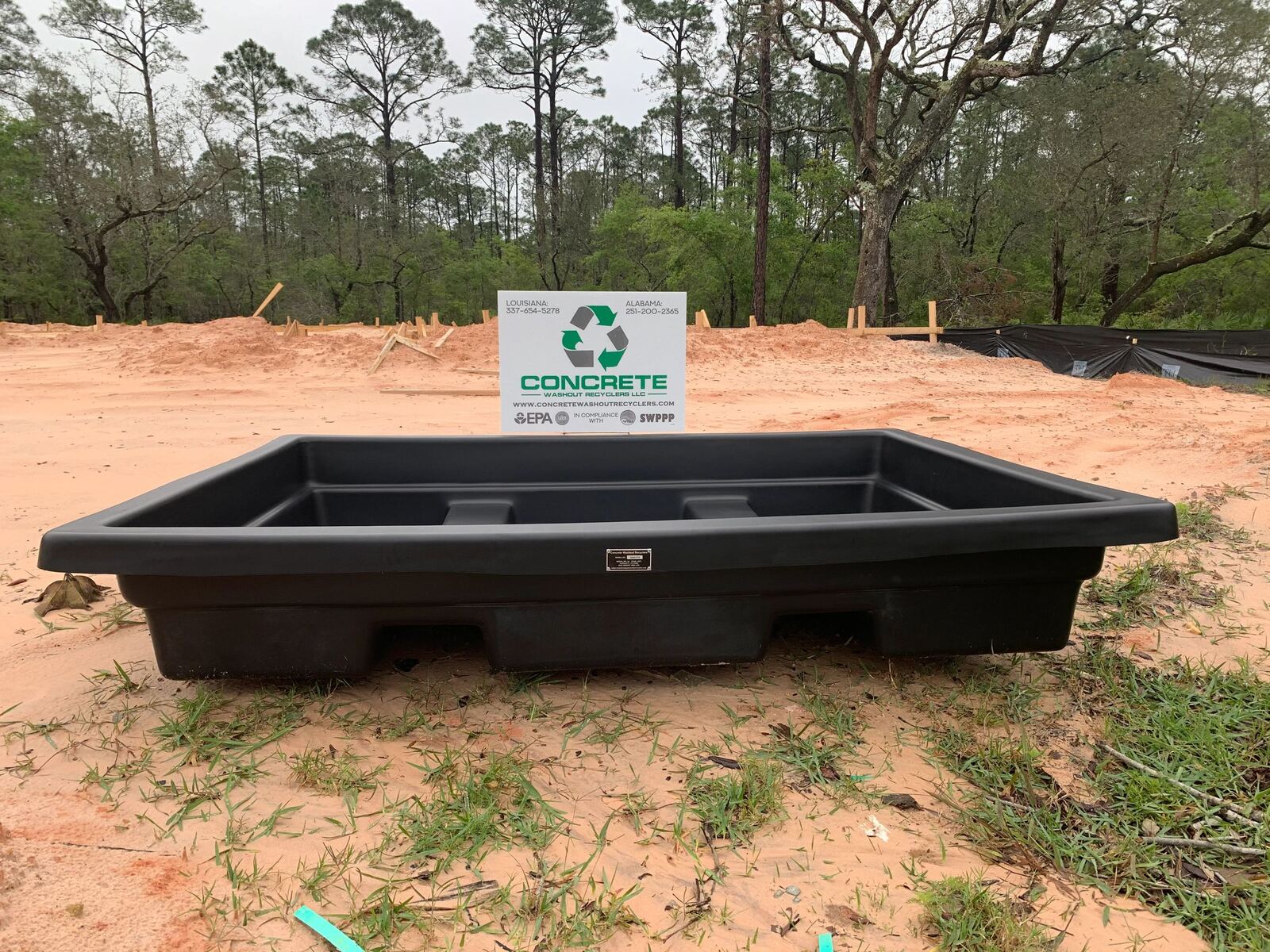 A reusable concrete washout basin for sale, viewed head on